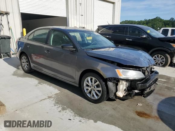 ✅ 2015 Volkswagen Jetta SE • VIN: 3VWD17AJ7FM269999 • Lot: 57522855. Listed on Copart with 131,259 mi. Free auction sales archive from the USA and detailed vehicle history report at DreamBid. Image 4.