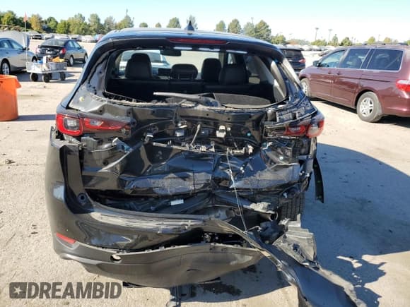 ✅ 2023 Mazda CX-5 S Carbon Edition • VIN: JM3KFBCM0P0203019 • Лот: 85543225. Опубликован ранее на Copart с пробегом 22 464 миль. Бесплатный доступ к архиву аукционных продаж из США и подробный отчёт об истории автомобиля на DreamBid. Изображение 6.