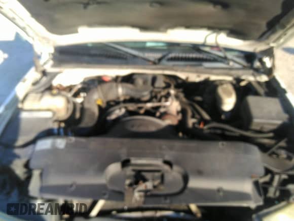 2004 Chevrolet Silverado 1500 Work Truck z VIN 1GCEC14X94Z312331, wystawiony jako IAAI lot #32433839 z przebiegiem 262 306 mil mil oraz . Historia ofert i sprzedaży dostępna na DreamBid. Obrazek 10.