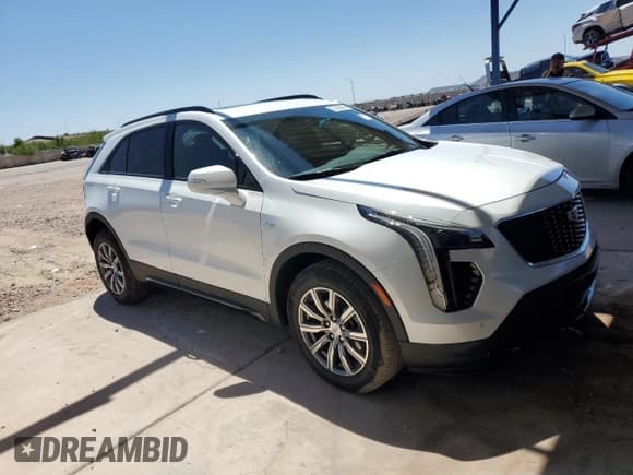 ✅ 2023 Cadillac XT4 AWD Sport • VIN: 1GYFZFR40PF211337 • Лот: 57353945. Опубликован ранее на Copart с пробегом 23 497 миль. Бесплатный доступ к архиву аукционных продаж из США и подробный отчёт об истории автомобиля на DreamBid. Изображение 4.