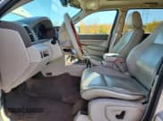 ✅ 2009 Jeep Grand Cherokee • VIN: 1J8HR68T69C520847 • Lot: 89548155. Listed on Copart with 322,340 mi. Free auction sales archive from the USA and detailed vehicle history report at DreamBid. Image 7.