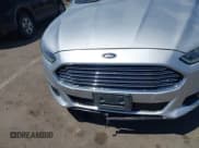 ✅ 2013 Ford Fusion Titanium Hybrid • VIN: 3FA6P0RUXDR388796 • Lot: 42840013. Listed on IAAI with Not provided. Free auction sales archive from the USA and detailed vehicle history report at DreamBid. Image 6.