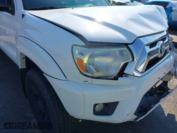 ✅ 2015 Toyota Tacoma PreRunner • VIN: 5TFKU4HN6FX006874 • Lot: 43090148. Listed on IAAI with 182,527 mi. Free auction sales archive from the USA and detailed vehicle history report at DreamBid. Image 18.