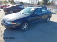 ✅ 2001 Oldsmobile Alero GL2 • VIN: 1G3NL52E81C231960 • Lot: 41634551. Listed on IAAI with 132,907 mi. Free auction sales archive from the USA and detailed vehicle history report at DreamBid. Image 2.