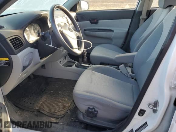 2011 Hyundai Accent GLS z VIN KMHCN4AC5BU607596, wystawiony jako Copart lot #79515184 z przebiegiem 137 475 mil mil oraz Szkoda całkowita • Salvage title. Historia ofert i sprzedaży dostępna na DreamBid. Obrazek 7.