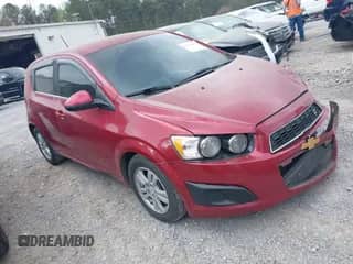 2012 Chevrolet Sonic LT z VIN 1G1JD6SBXC4179292, wystawiony jako IAAI lot #41940825 z przebiegiem 185 150 mil mil oraz . Historia ofert i sprzedaży dostępna na DreamBid. Obrazek 1.