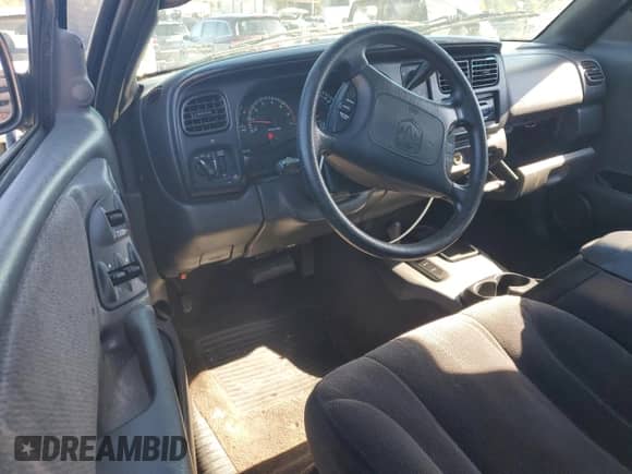 2000 Dodge Dakota Sport with VIN 1B7GG22N3YS710427, listed as a Copart auction lot 91010195 with 167,549 mi miles and Clean title. Bid and sale history available at DreamBid. Image 8.