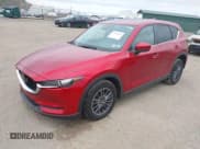 ✅ 2021 Mazda CX-5 Touring • VIN: JM3KFBCM4M0437448 • Lot: 43560635. Wystawiony na IAAI z przebiegiem 41 044 mil. Bezpłatny archiwum sprzedaży aukcyjnych z USA i szczegółowy raport historii pojazdu na DreamBid. Zdjęcie 18.