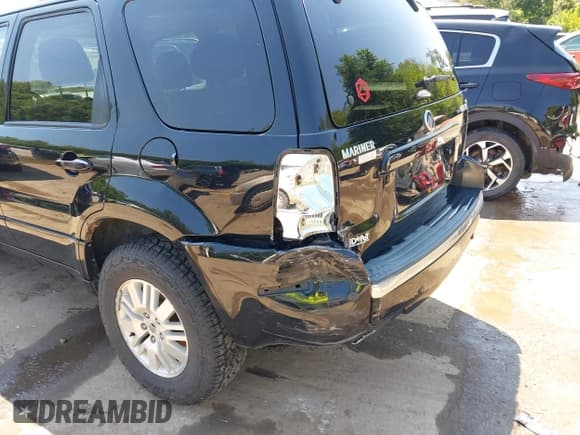 ✅ 2005 Mercury Mariner Luxury • VIN: 4M2CU57125DJ03007 • Lot: 42890807. Listed on IAAI with 197,267 mi. Free auction sales archive from the USA and detailed vehicle history report at DreamBid. Image 6.