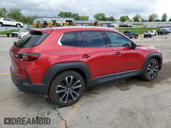 ✅ 2023 Mazda CX-50 S Premium Plus • VIN: 7MMVABEM5PN112574 • Lot: 54668665. Listed on Copart with 88,309 mi. Free auction sales archive from the USA and detailed vehicle history report at DreamBid. Image 3.