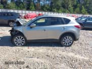 ✅ 2013 Mazda CX-5 Grand Touring • VIN: JM3KE2DE0D0128098 • Лот: 41162204. Опубликован ранее на IAAI с пробегом Не указан. Бесплатный доступ к архиву аукционных продаж из США и подробный отчёт об истории автомобиля на DreamBid. Изображение 14.