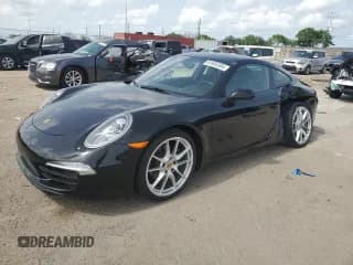 ✅ 2013 Porsche 911 Carrera • VIN: WP0AA2A91DS106896 • Лот: 61934304. Опубликован ранее на Copart с пробегом Не указан. Бесплатный доступ к архиву аукционных продаж из США и подробный отчёт об истории автомобиля на DreamBid. Изображение 1.