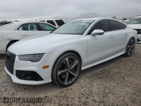 ✅ 2016 Audi RS 7 Prestige • VIN: WUAW2BFC1GN902562 • Lot: 57022995. Wystawiony na Copart z przebiegiem 74 433 mil. Bezpłatny archiwum sprzedaży aukcyjnych z USA i szczegółowy raport historii pojazdu na DreamBid. Zdjęcie 1.