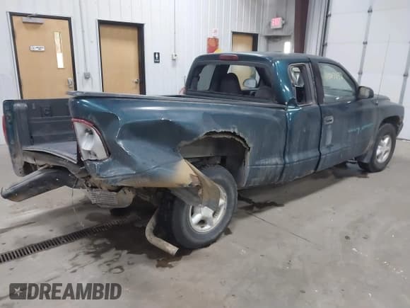 ✅ 1998 Dodge Dakota • VIN: 1B7FL22P1WS723652 • Lot: 41507852. Listed on IAAI with 296,031 mi. Free auction sales archive from the USA and detailed vehicle history report at DreamBid. Image 4.
