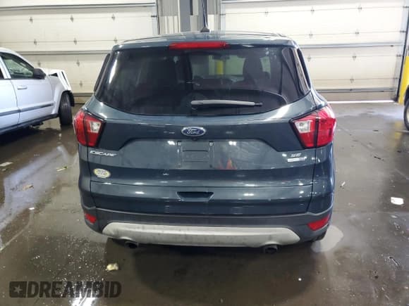 ✅ 2019 Ford Escape SE • VIN: 1FMCU9GD2KUB32862 • Lot: 83821195. Listed on Copart with 131,263 mi. Free auction sales archive from the USA and detailed vehicle history report at DreamBid. Image 6.