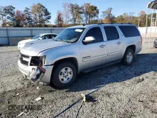 ✅ 2014 Chevrolet Suburban LT • VIN: 1GNSCJE05ER196090 • Lot: 90521905. Listed on Copart with 221,298 mi. Free auction sales archive from the USA and detailed vehicle history report at DreamBid. Image 1.