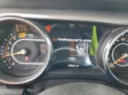 ✅ 2021 Jeep Wrangler Islander • VIN: 1C4GJXAN4MW695763 • Lot: 91552795. Wystawiony na Copart z przebiegiem 60 864 mil. Bezpłatny archiwum sprzedaży aukcyjnych z USA i szczegółowy raport historii pojazdu na DreamBid. Zdjęcie 9.