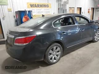 ✅ 2013 Buick LaCrosse Premium 2 • VIN: 1G4GH5E32DF120162 • Lot: 43075484. Listed on IAAI with 198,227 mi. Free auction sales archive from the USA and detailed vehicle history report at DreamBid. Image 4.
