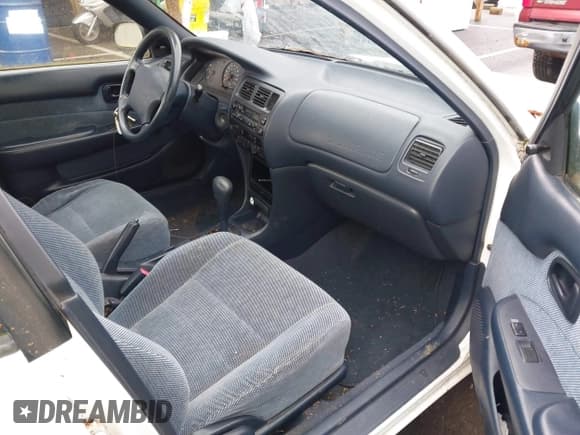 ✅ 1995 Toyota Corolla DX • VIN: 1NXAE09B9SZ288571 • Lot: 41789288. Wystawiony na IAAI z przebiegiem 181 236 mil. Bezpłatny archiwum sprzedaży aukcyjnych z USA i szczegółowy raport historii pojazdu na DreamBid. Zdjęcie 5.