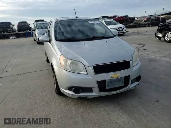 2009 Chevrolet Aveo 1LT z VIN KL1TD66E59B672121, wystawiony jako Copart lot #82662134 z przebiegiem 111 612 mil mil oraz Czysty tytuł • Clean title. Historia ofert i sprzedaży dostępna na DreamBid. Obrazek 12.
