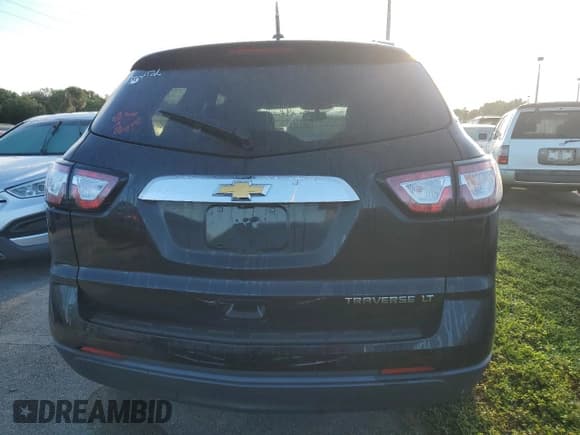 ✅ 2016 Chevrolet Traverse LT • VIN: 1GNKRGKDXGJ130953 • Lot: 74366474. Wystawiony na Copart z przebiegiem 59 774 mil. Bezpłatny archiwum sprzedaży aukcyjnych z USA i szczegółowy raport historii pojazdu na DreamBid. Zdjęcie 6.
