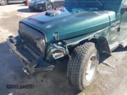 ✅ 2001 Jeep Wrangler Sport • VIN: 1J4FA49SX1P331951 • Лот: 43494613. Опубликован ранее на IAAI с пробегом 86 086 миль. Бесплатный доступ к архиву аукционных продаж из США и подробный отчёт об истории автомобиля на DreamBid. Изображение 6.