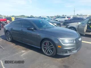 ✅ 2018 Audi A7 Premium Plus • VIN: WAUW3AFC9JN100673 • Lot: 42791127. Listed on IAAI with 35,241 mi. Free auction sales archive from the USA and detailed vehicle history report at DreamBid. Image 1.