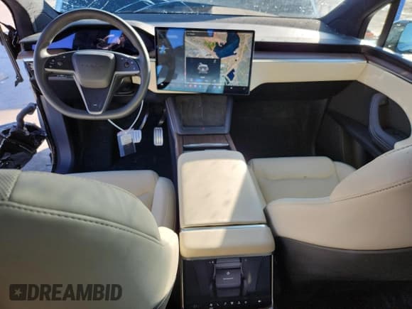 ✅ 2023 Tesla Model X • VIN: 7SAXCBE5XPF409238 • Lot: 80333405. Wystawiony na Copart z przebiegiem 28 671 mil. Bezpłatny archiwum sprzedaży aukcyjnych z USA i szczegółowy raport historii pojazdu na DreamBid. Zdjęcie 8.