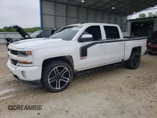 ✅ 2017 Chevrolet Silverado 1500 LT • VIN: 3GCUKREH9HG256580 • Лот: 58173425. Опубликован ранее на Copart с пробегом 80 162 миль. Бесплатный доступ к архиву аукционных продаж из США и подробный отчёт об истории автомобиля на DreamBid. Изображение 1.