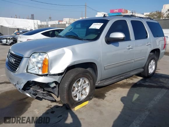✅ 2014 GMC Yukon SLT • VIN: 1GKS1CE02ER119966 • Lot: 43609568. Listed on IAAI with 133,605 mi. Free auction sales archive from the USA and detailed vehicle history report at DreamBid. Image 2.
