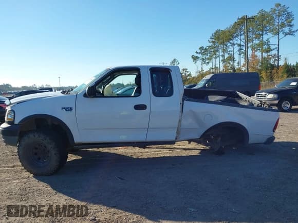 ✅ 2003 Ford F-150 XL • VIN: 1FTRX18W33NA80256 • Lot: 43718586. Listed on IAAI with 138,955 mi. Free auction sales archive from the USA and detailed vehicle history report at DreamBid. Image 14.
