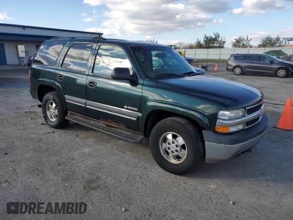 ✅ 2003 Chevrolet Tahoe LT • VIN: 1GNEK13Z93J320228 • Lot: 90615665. Listed on Copart with 234,023 mi. Free auction sales archive from the USA and detailed vehicle history report at DreamBid. Image 4.