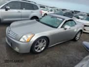 ✅ 2004 Cadillac XLR • VIN: 1G6YV34A545602056 • Lot: 66506514. Wystawiony na Copart z przebiegiem Nie podano. Bezpłatny archiwum sprzedaży aukcyjnych z USA i szczegółowy raport historii pojazdu na DreamBid. Zdjęcie 1.