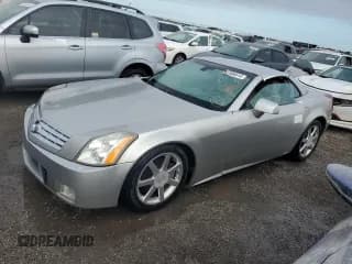 ✅ 2004 Cadillac XLR • VIN: 1G6YV34A545602056 • Lot: 66506514. Wystawiony na Copart z przebiegiem Nie podano. Bezpłatny archiwum sprzedaży aukcyjnych z USA i szczegółowy raport historii pojazdu na DreamBid. Zdjęcie 1.