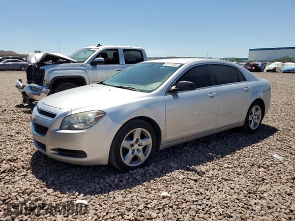 ✅ 2012 Chevrolet Malibu 1FL • VIN: 1G1ZA5E0XCF212800 • Lot: 57111634. Listed on Copart with 163,560 mi. Free auction sales archive from the USA and detailed vehicle history report at DreamBid. Image 1.
