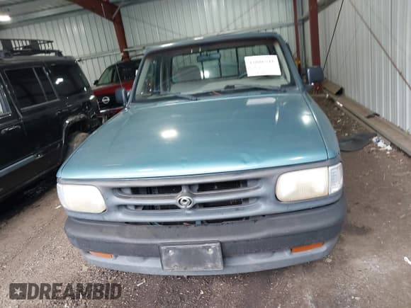 ✅ 1994 Mazda B-Series • VIN: 4F4CR12A5RTM80943 • Lot: 42886371. Wystawiony na IAAI z przebiegiem 212 185 mil. Bezpłatny archiwum sprzedaży aukcyjnych z USA i szczegółowy raport historii pojazdu na DreamBid. Zdjęcie 12.