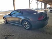 ✅ 2004 Ford Mustang Standard • VIN: 1FAFP40674F148785 • Lot: 94682085. Listed on Copart with 107,719 mi. Free auction sales archive from the USA and detailed vehicle history report at DreamBid. Image 2.