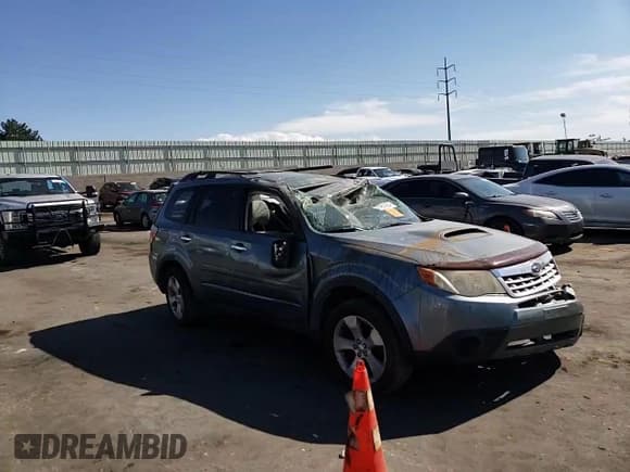 ✅ 2011 Subaru Forester XT Premium • VIN: JF2SHGAC6BH715096 • Лот: 74814204. Опубликован ранее на Copart с пробегом Не указан. Бесплатный доступ к архиву аукционных продаж из США и подробный отчёт об истории автомобиля на DreamBid. Изображение 12.