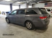 ✅ 2014 Honda Odyssey EX-L • VIN: 5FNRL5H63EB082495 • Лот: 82491235. Опубликован ранее на Copart с пробегом 164 020 миль. Бесплатный доступ к архиву аукционных продаж из США и подробный отчёт об истории автомобиля на DreamBid. Изображение 2.