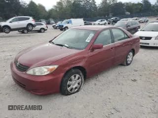 ✅ 2002 Toyota Camry LE • VIN: 4T1BE32K32U572200 • Lot: 82237535. Listed on Copart with 119,959 mi. Free auction sales archive from the USA and detailed vehicle history report at DreamBid. Image 1.