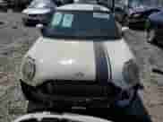 2009 MINI Hardtop with VIN WMWMF33539TT69081, listed as a Copart auction lot 58087205 with 106,470 mi miles and Salvage title. Bid and sale history available at DreamBid. Image 5.