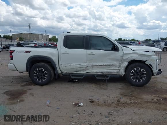✅ 2023 Nissan Frontier SV • VIN: 1N6ED1EK4PN629149 • Lot: 43280024. Listed on IAAI with 60,390 mi. Free auction sales archive from the USA and detailed vehicle history report at DreamBid. Image 13.
