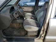 ✅ 1997 Kia Sportage • VIN: KNDJA7235V5538866 • Lot: 79728424. Wystawiony na Copart z przebiegiem 117 230 mil. Bezpłatny archiwum sprzedaży aukcyjnych z USA i szczegółowy raport historii pojazdu na DreamBid. Zdjęcie 7.