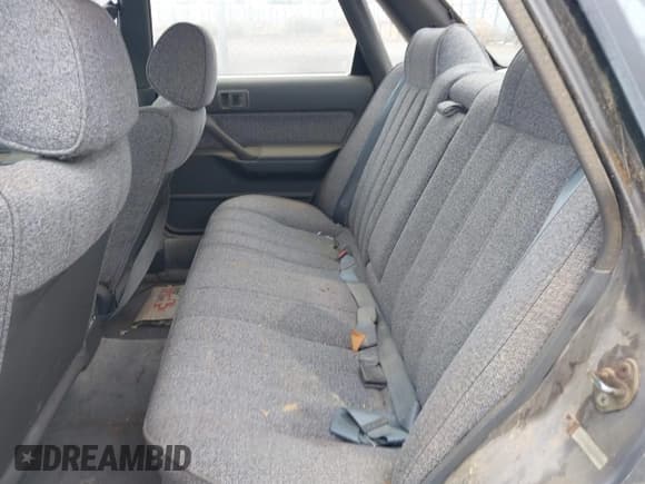 ✅ 1990 Toyota Camry DLX • VIN: 4T1SV21EXLU271320 • Лот: 41798353. Опубликован ранее на IAAI с пробегом 269 178 миль. Бесплатный доступ к архиву аукционных продаж из США и подробный отчёт об истории автомобиля на DreamBid. Изображение 8.