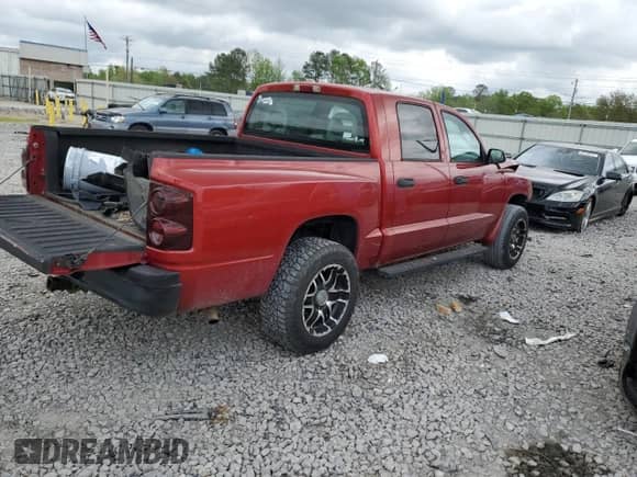 2006 Dodge Dakota ST z VIN 1D7HE28K66S509857, wystawiony jako Copart lot #63910594 z przebiegiem 216 921 mil mil oraz Szkoda całkowita • Salvage title. Historia ofert i sprzedaży dostępna na DreamBid. Obrazek 3.