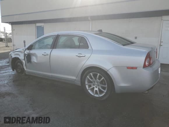 ✅ 2012 Chevrolet Malibu LTZ • VIN: 1G1ZG5E7XCF128343 • Lot: 74536074. Listed on Copart with 132,162 mi. Free auction sales archive from the USA and detailed vehicle history report at DreamBid. Image 2.