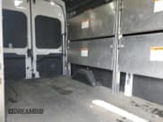 ✅ 2023 Ford Transit Cargo • VIN: 1FTBR2X88PKA66512 • Лот: 58451445. Опубликован ранее на Copart с пробегом 74 819 миль. Бесплатный доступ к архиву аукционных продаж из США и подробный отчёт об истории автомобиля на DreamBid. Изображение 11.