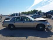 ✅ 2001 Ford Crown Victoria • VIN: 2FAFP73W01X131209 • Lot: 43033250. Listed on IAAI with 241,898 mi. Free auction sales archive from the USA and detailed vehicle history report at DreamBid. Image 12.