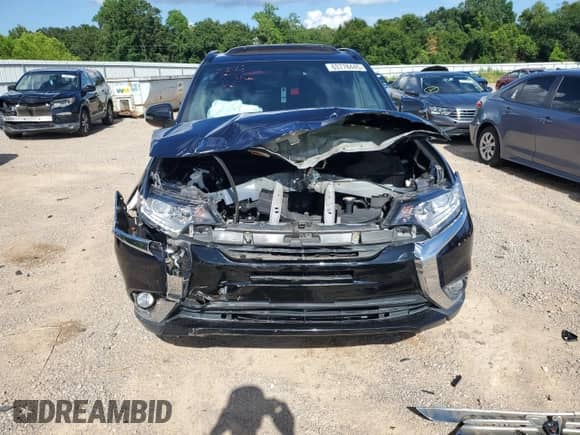 2018 Mitsubishi Outlander SE with VIN JA4AD3A38JZ054124, listed as a Copart auction lot 63778445 with 106,643 mi miles and Salvage title. Bid and sale history available at DreamBid. Image 5.