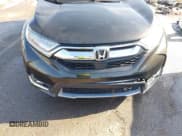 ✅ 2018 Honda CR-V Touring • VIN: 7FARW2H90JE052921 • Lot: 43671364. Listed on IAAI with 101,261 mi. Free auction sales archive from the USA and detailed vehicle history report at DreamBid. Image 6.